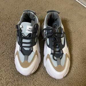 9.5 Woman’s athletic sneakers.